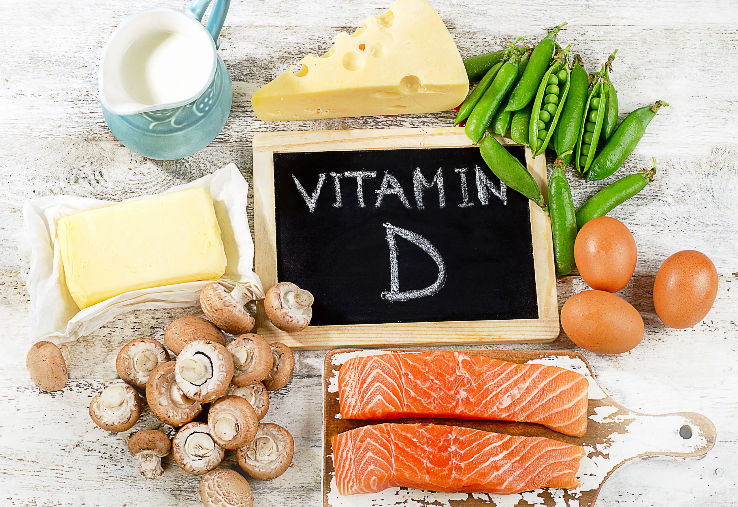 Foods rich in Vitamin D such as salmon, eggs, and cheeses.